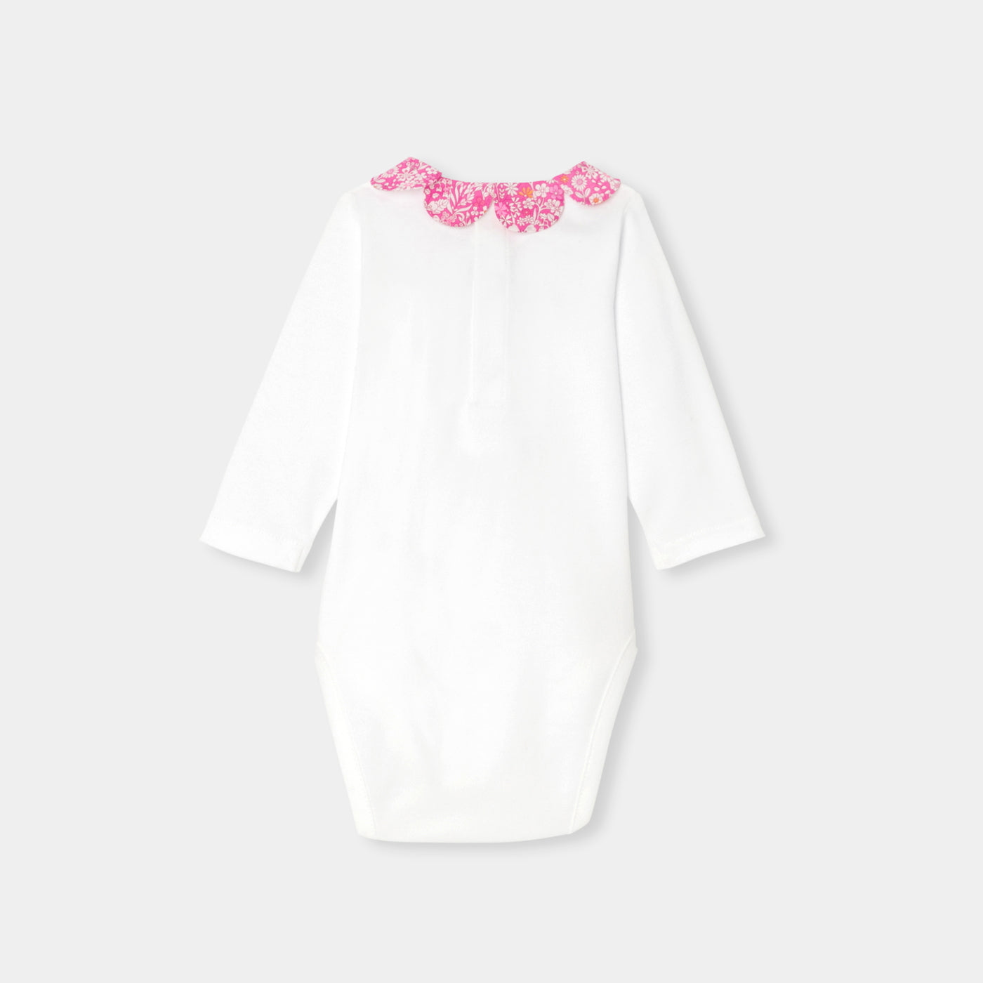 Baby girl bodysuit with petal collar