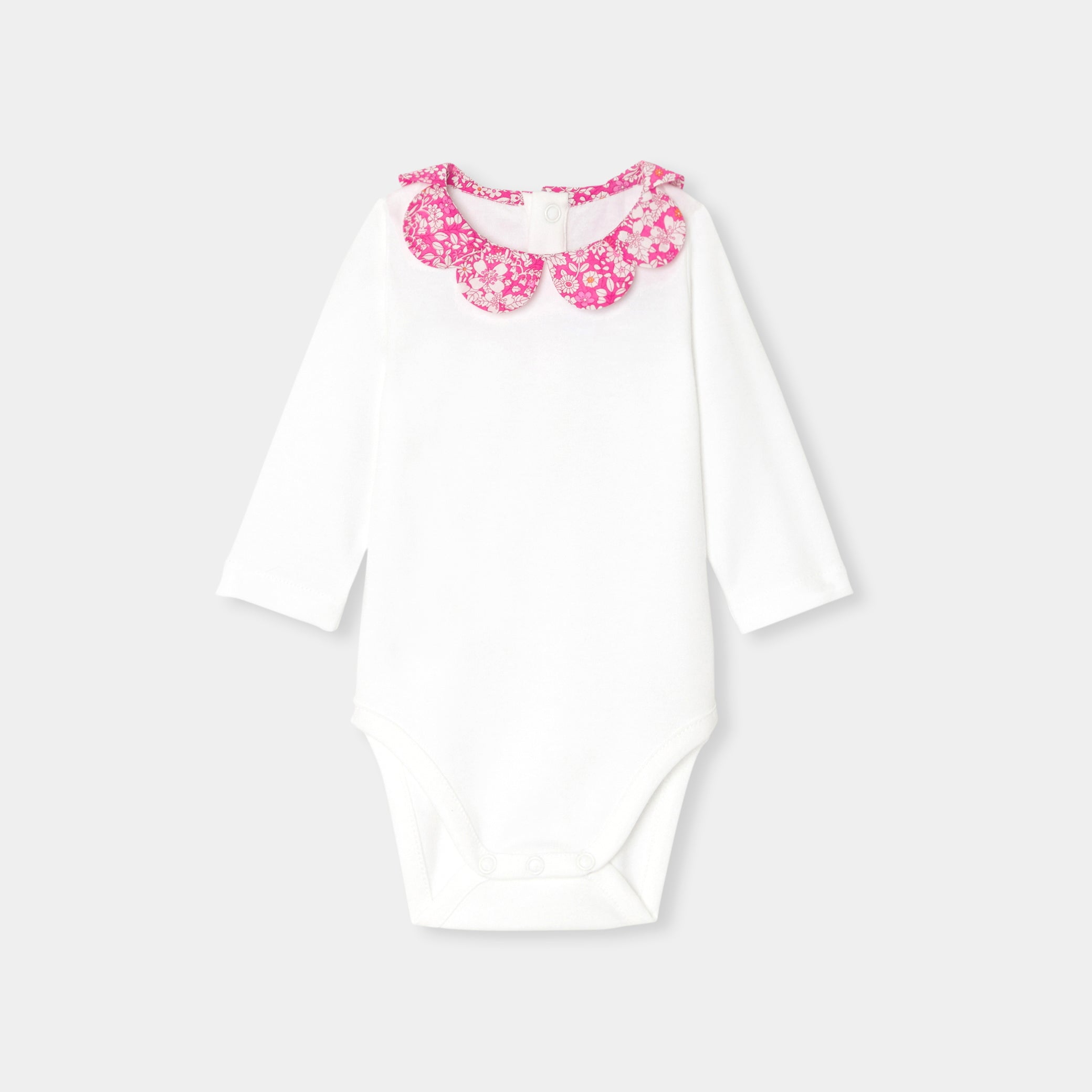 Baby girl bodysuit with petal collar