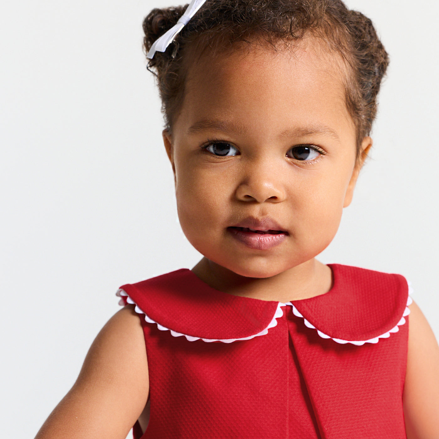 Baby girl sleeveless dress in cotton piqué