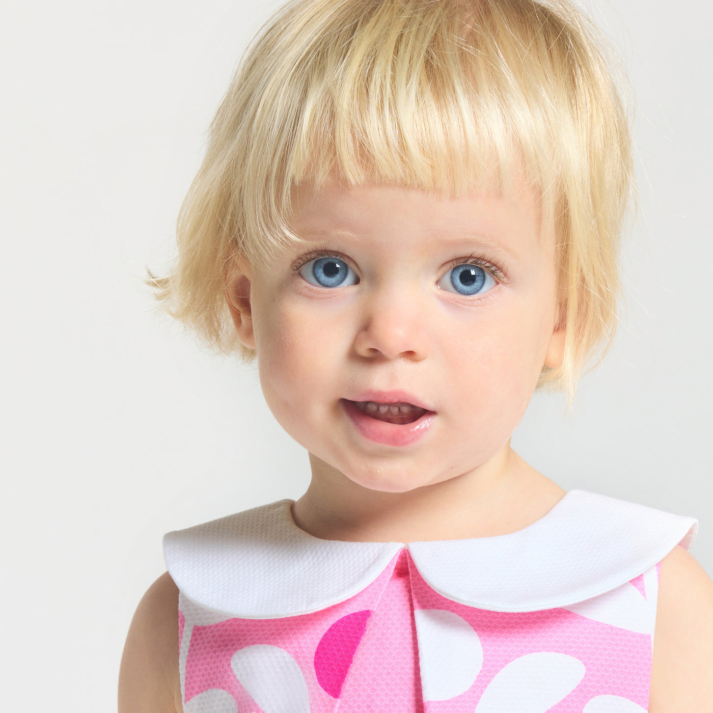 Baby girl dress with plant motif
