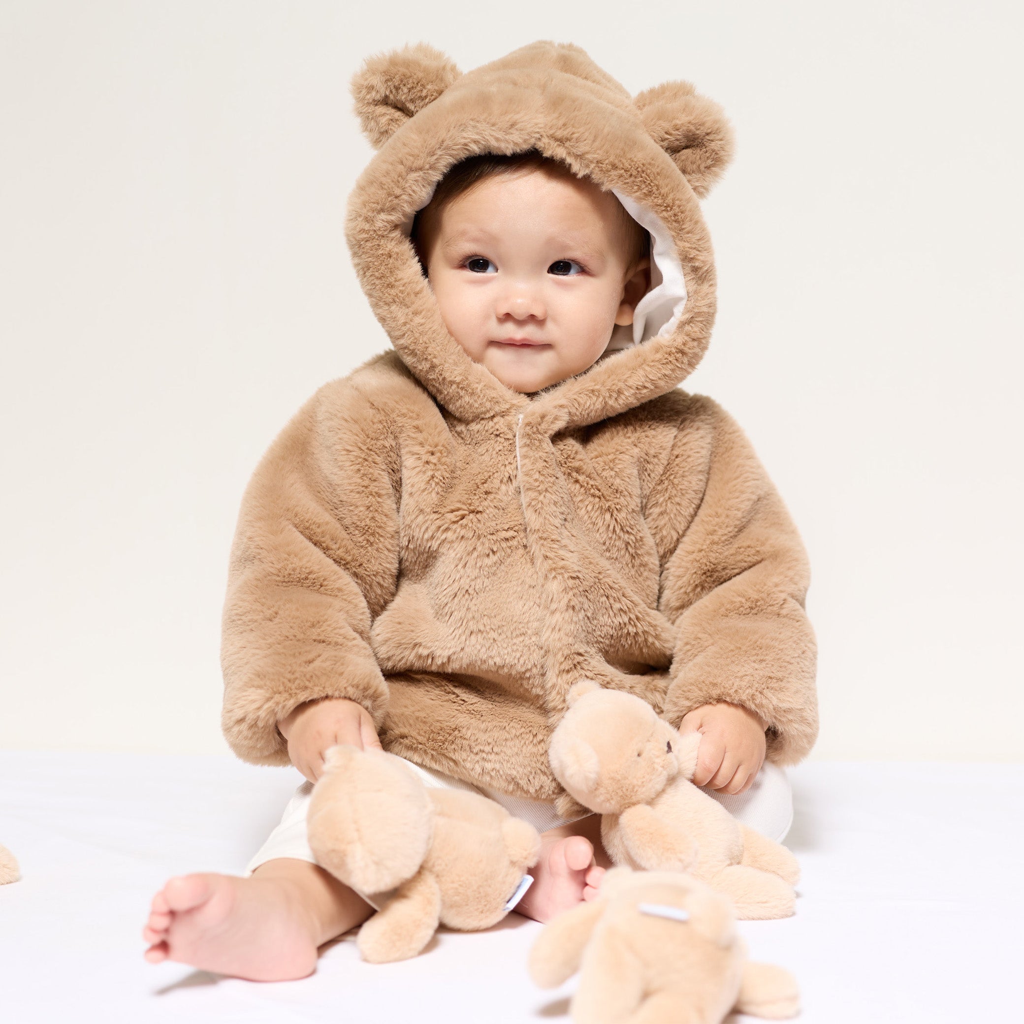 Baby coat in faux fur